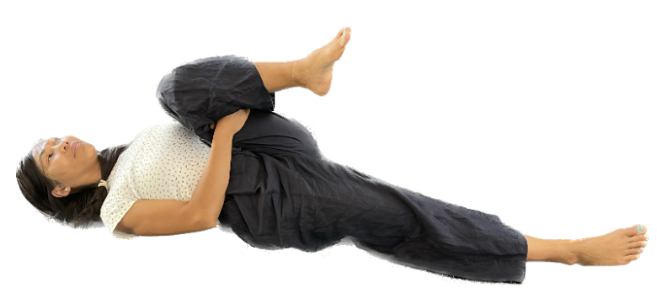 Photograph of a woman laying in the Chest to Knee position